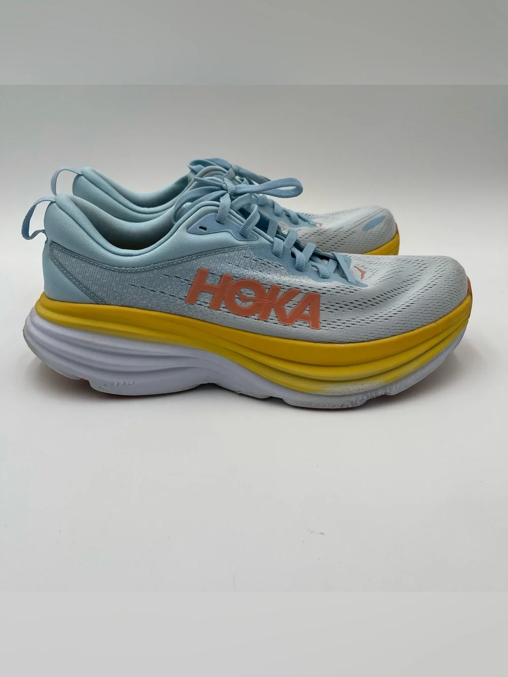 Hoka Women's Light Blue with Yellow & Orange Accent Running Shoes